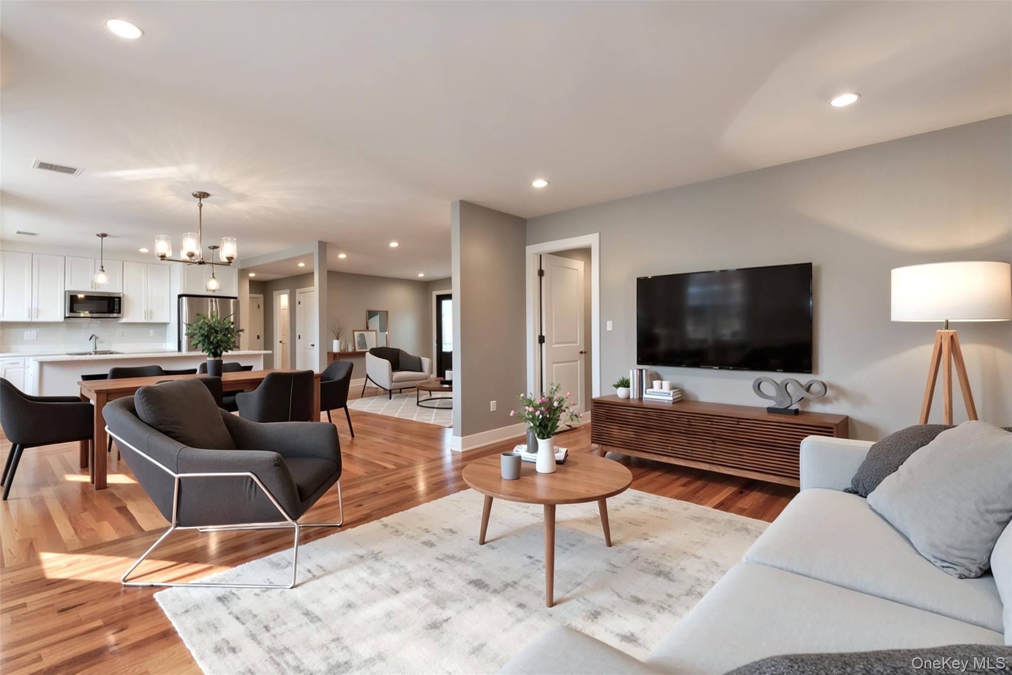 142 Crooked Hill Road Huntington Station, NY 11746 - Photo 6 of 18 Living room with a chandelier, recessed lighting, and light wood-style flooring