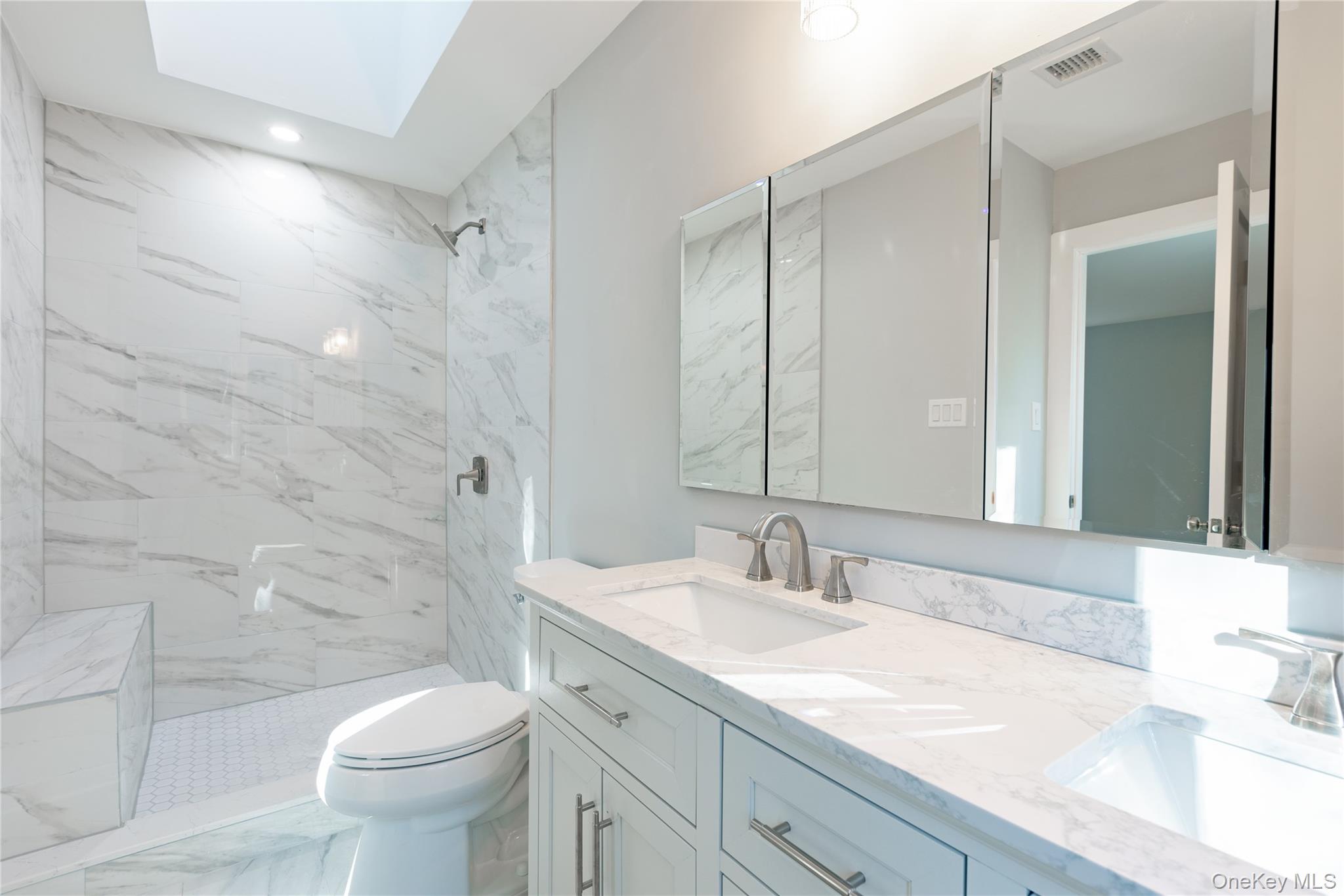 142 Crooked Hill Road Huntington Station, NY 11746 - Photo 9 of 18 Dual vanity, walk-in shower with bench, tile floor,