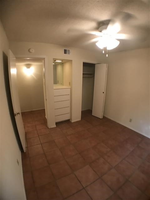 2610 Salado Street, Unit 212 Austin, TX 78705 - Photo 8 of 15 a view of hallway with stairs and wooden floor