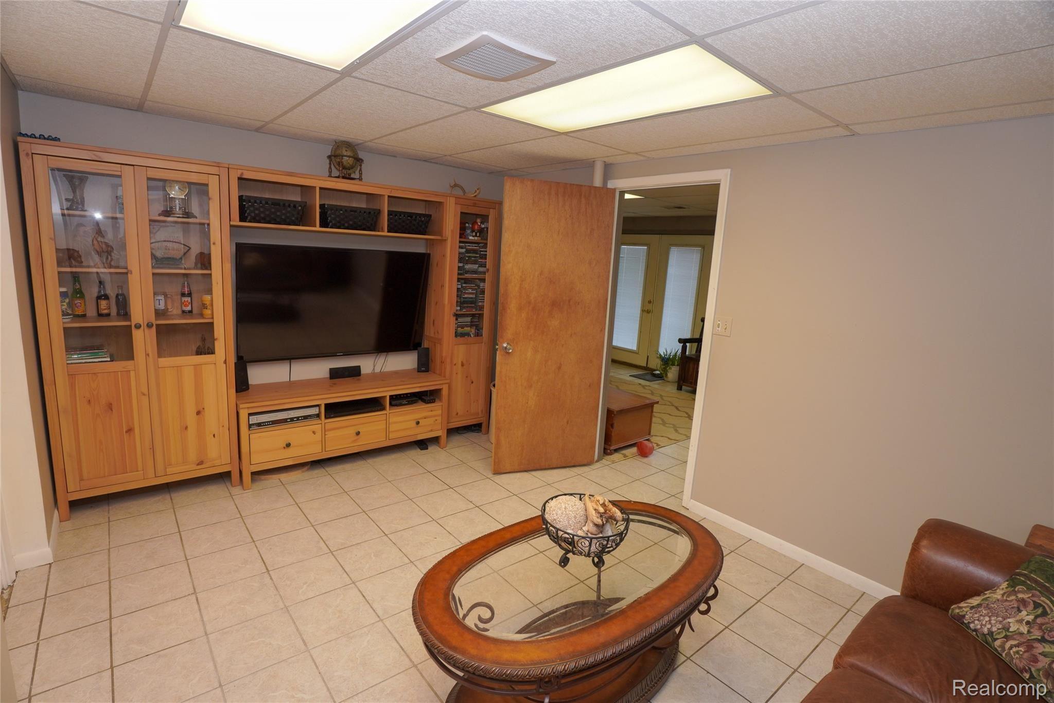 6996 Crofoot Road Fowlerville, MI 48836 - Photo 23 of 36 Movie room In Finished Lower Level!