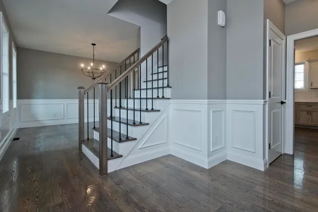 a view of entryway with wooden floor