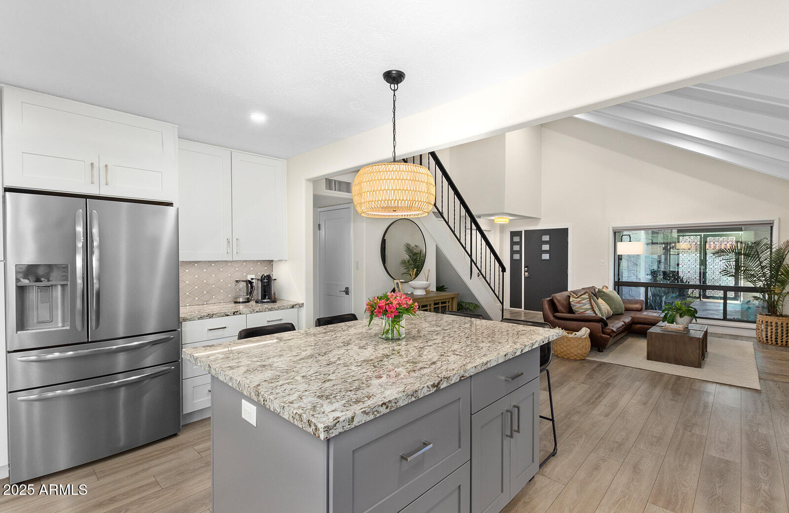 5822 North Scottsdale Road Paradise Valley, AZ 85253 - Photo 11 of 32 a kitchen view with stainless steel appliances granite countertop a refrigerator a stove and a sink