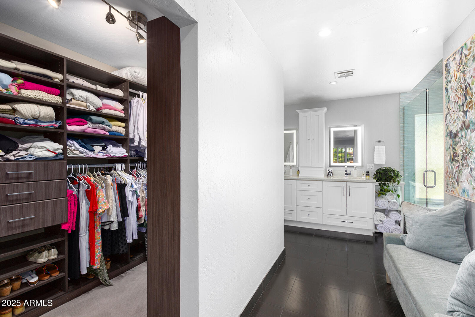 5822 North Scottsdale Road Paradise Valley, AZ 85253 - Photo 18 of 32 a view of walk in closet with clothes and shoes