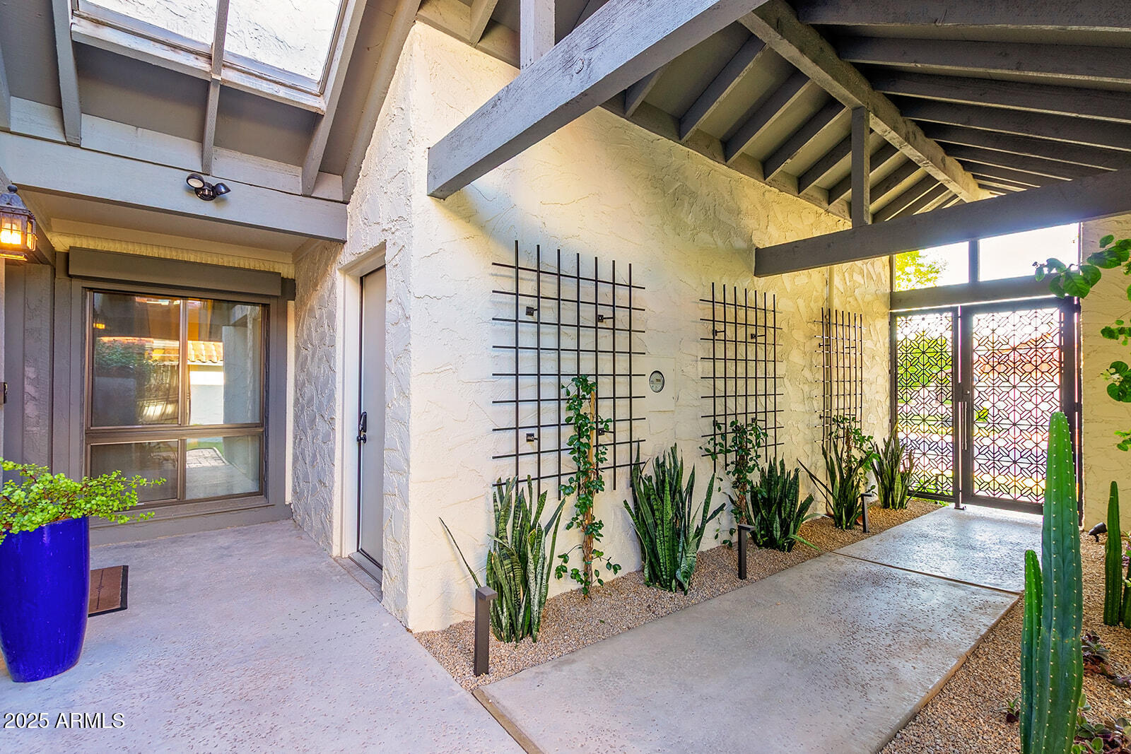 5822 North Scottsdale Road Paradise Valley, AZ 85253 - Photo 2 of 32 a view of entryway with patio