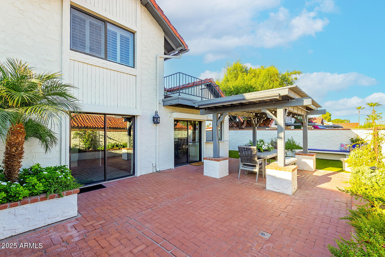 5822 North Scottsdale Road Paradise Valley, AZ 85253 - Photo 24 of 32 a front view of a house with porch