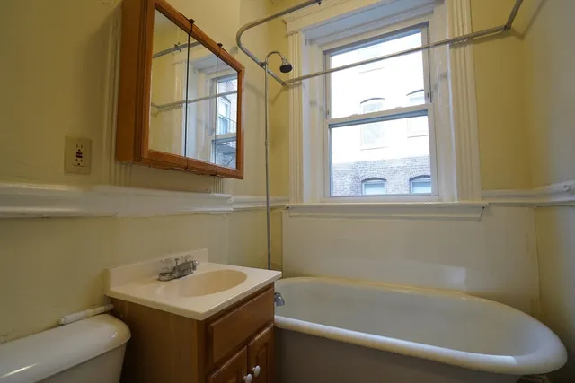 a bathroom with a sink and a bathtub