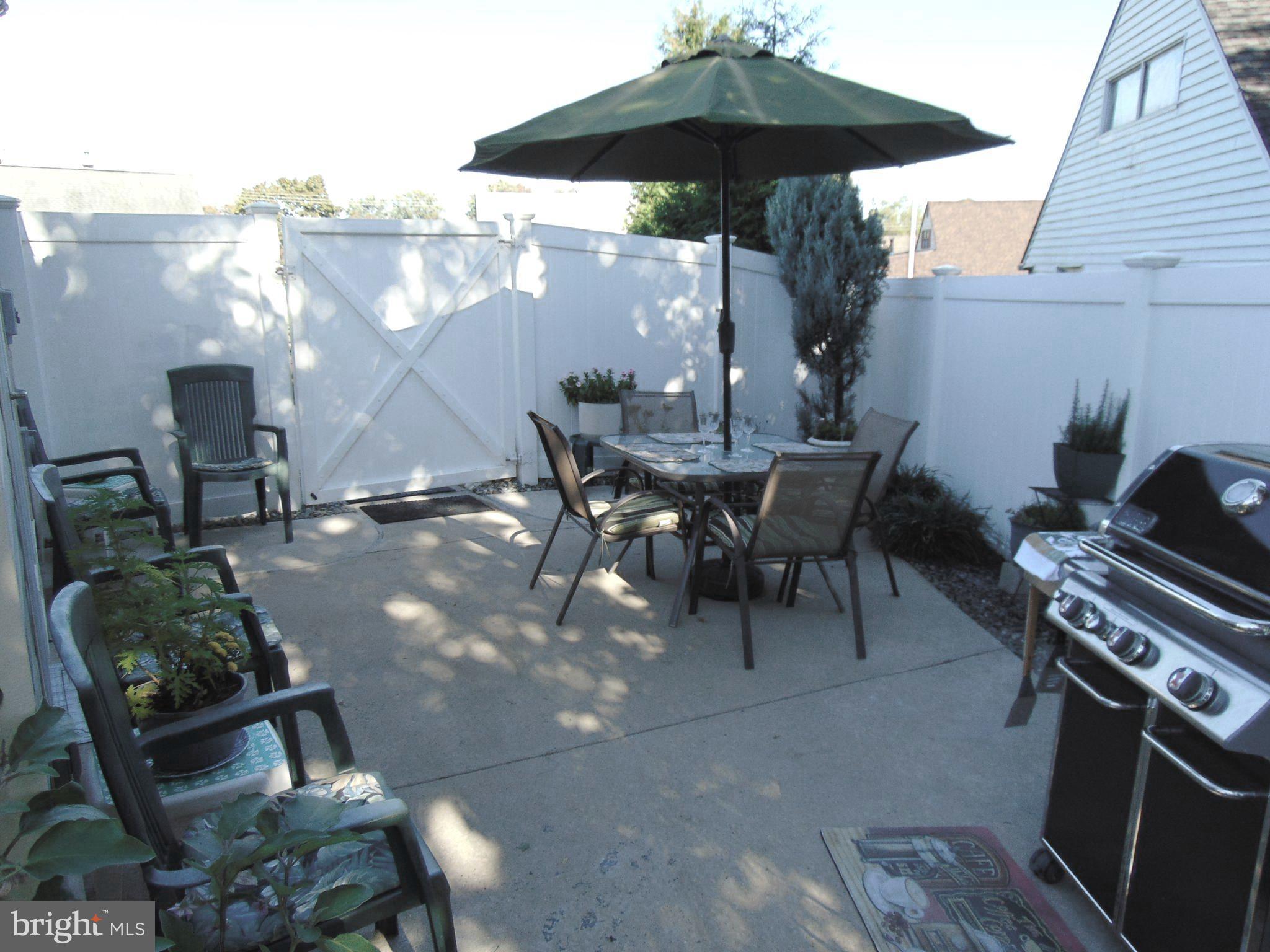 21 Cleft Rock Road Levittown, PA 19057 - Photo 13 of 54 Patio Area Side of House