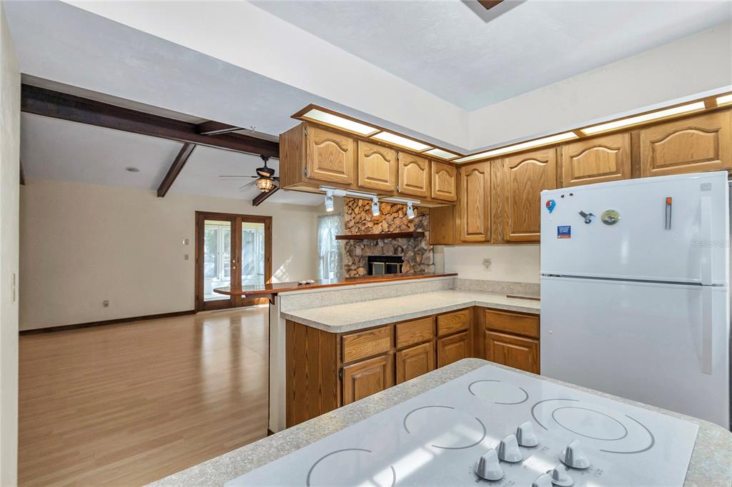 18012 Southwest 68th Loop Dunnellon, FL 34432 - Photo 17 of 60 a kitchen with a sink appliances and cabinets