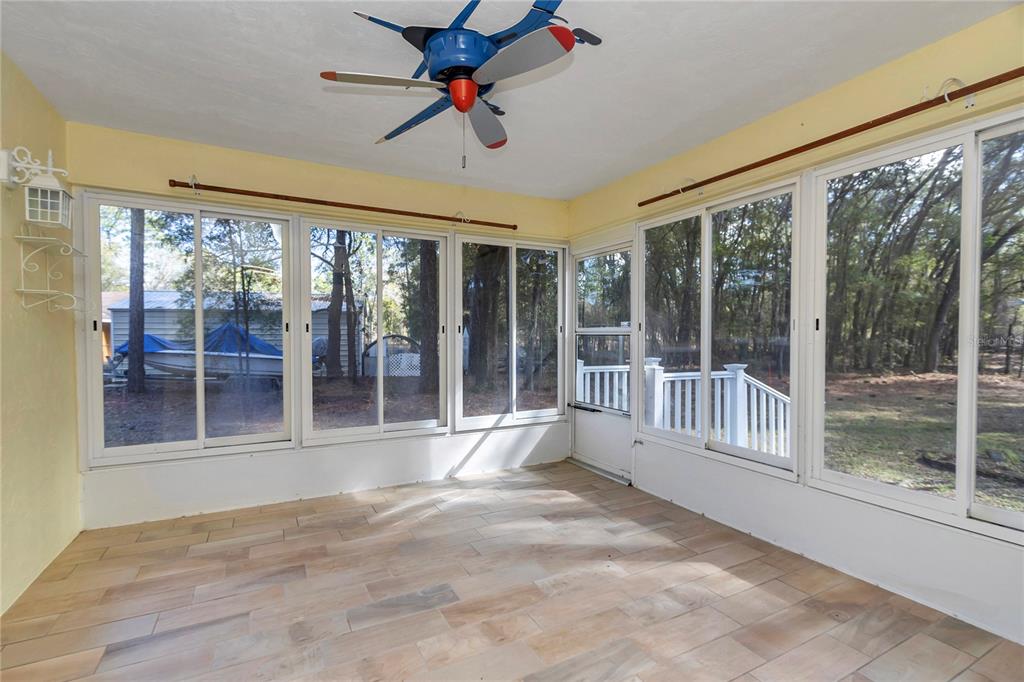 18012 Southwest 68th Loop Dunnellon, FL 34432 - Photo 27 of 60 a view of an empty room with a large window