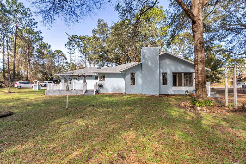 18012 Southwest 68th Loop Dunnellon, FL 34432 - Photo 44 of 60 a view of a house with a yard