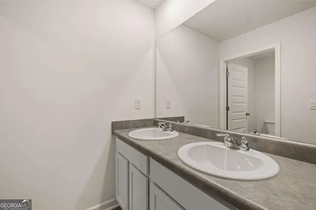 a view of a swimming pool with a lounge chairs