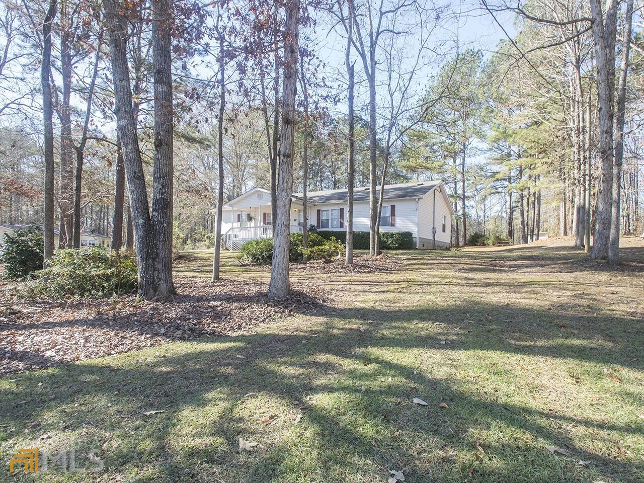 107 Friddell Road Jackson, GA 30233 - Photo 1 of 1 a backyard of a house with lots of green space