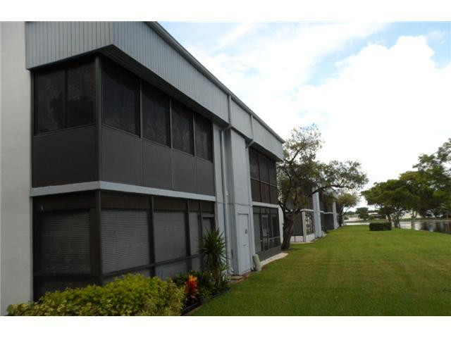 9920 Northwest 68th Place, Unit 210 Tamarac, FL 33321 - Photo 2 of 12 a view of outdoor space