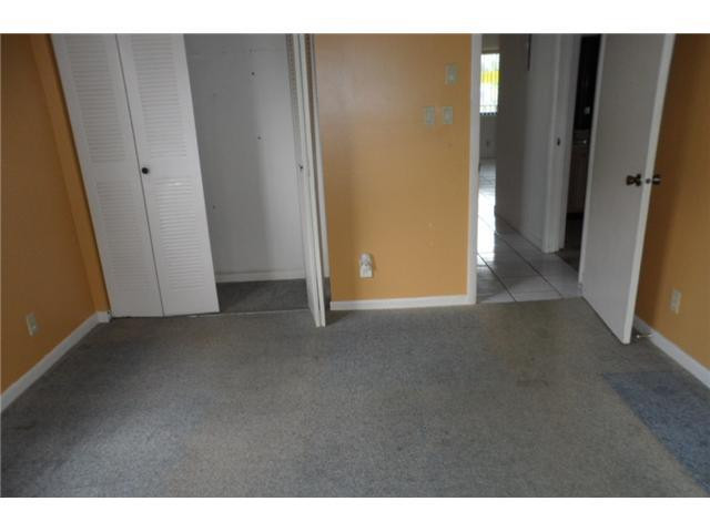 9920 Northwest 68th Place, Unit 210 Tamarac, FL 33321 - Photo 10 of 12 a view of empty room
