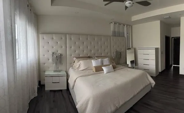 a bedroom with a bed and closet