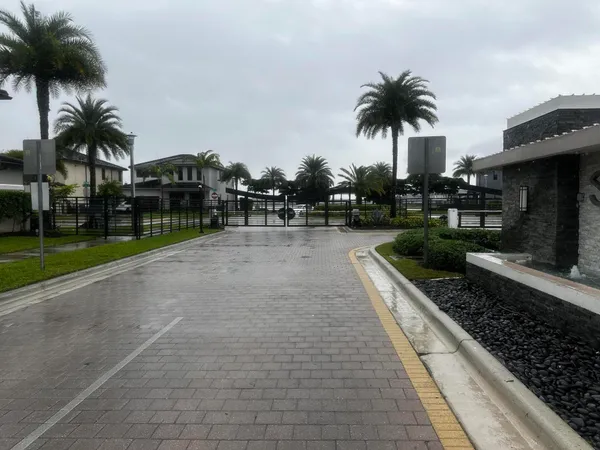 a swimming pool with outdoor seating and yard
