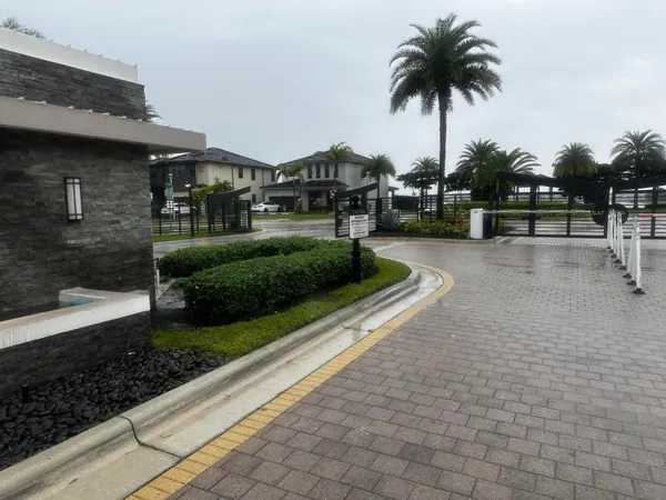a swimming pool with outdoor seating and yard