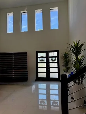 a view of a stairs and an empty room