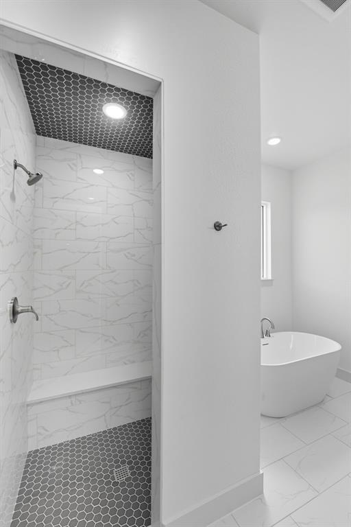 2050 Vista View Graford, TX 76449 - Photo 9 of 35 Full bath with a shower stall, a freestanding bath, and marble look tile flooring