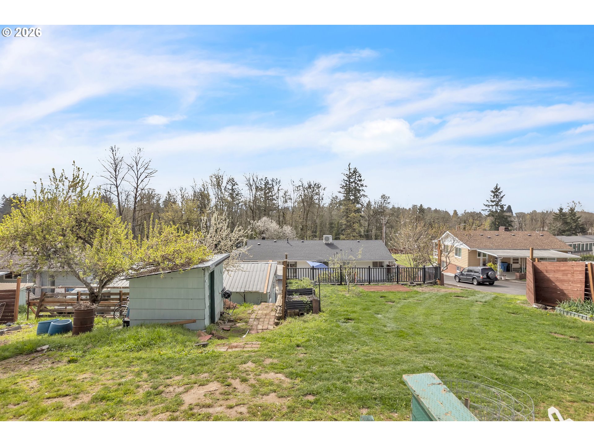 243 North Shepherd Road Washougal, WA 98671 - Photo 44 of 44 a backyard of a house with table and chairs