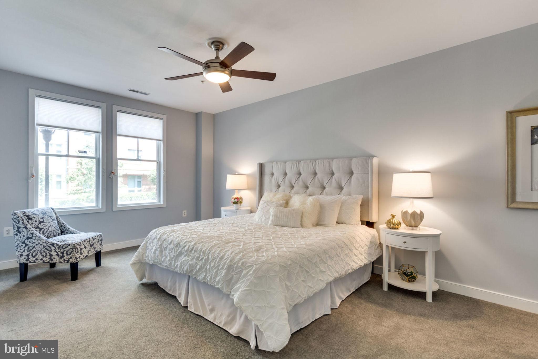 181 East Reed Avenue, Unit 109 Alexandria, VA 22305 - Photo 2 of 30 a bedroom with a bed and a window