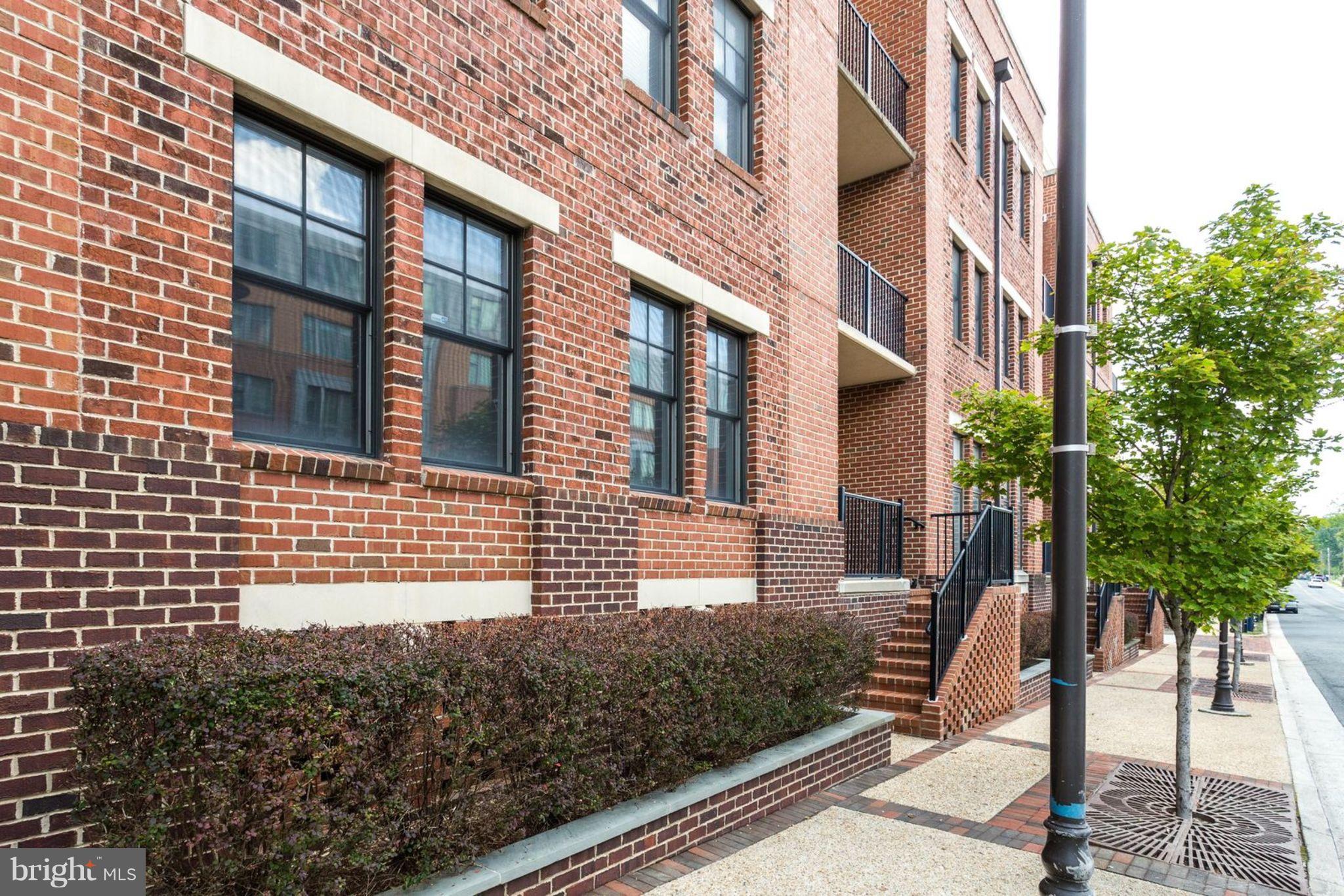 181 East Reed Avenue, Unit 109 Alexandria, VA 22305 - Photo 22 of 30 a view of a building with stairs