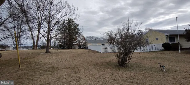 a view of a house with a trees
