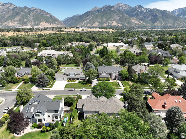 7740 Keswick Road Sandy, UT 84093 - Photo 71 of 74 Expansive residential area featuring numerous properties surrounded by mature trees and mountain scenery