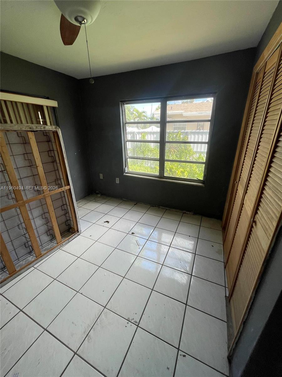 3630 Northwest 98th Street Miami, FL 33147 - Photo 16 of 38 a view of an empty room with windows