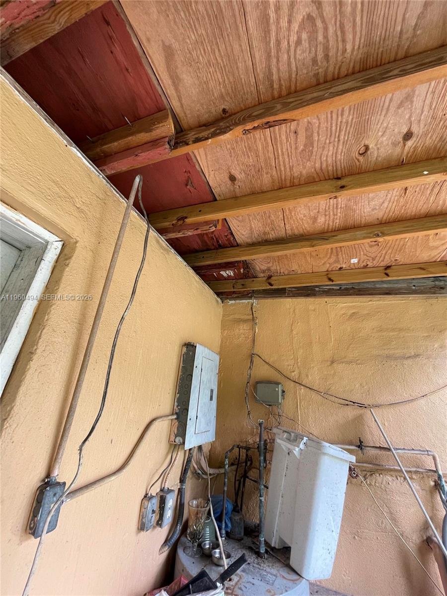 3630 Northwest 98th Street Miami, FL 33147 - Photo 31 of 38 a view of a room with storage and utility