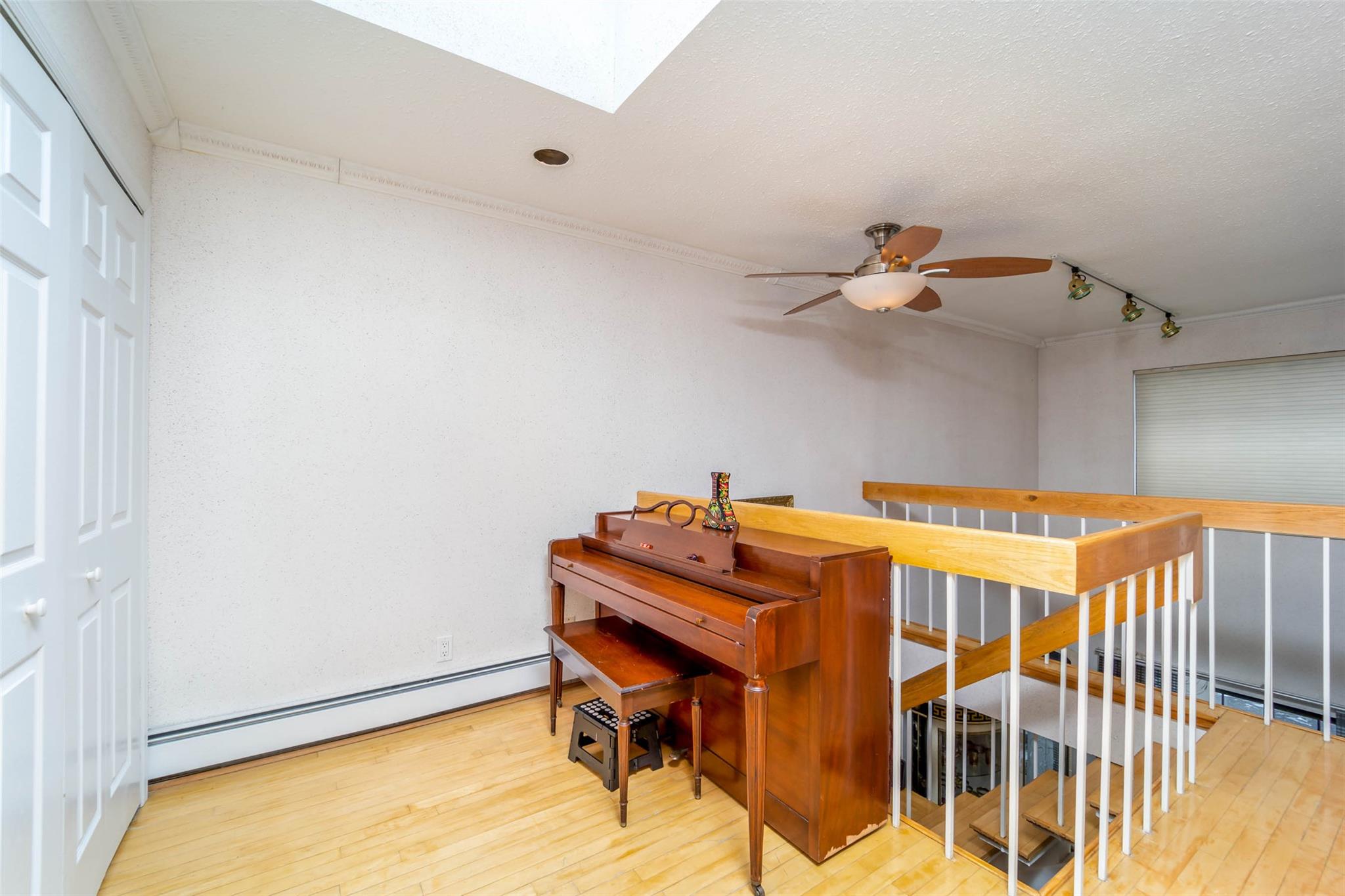 509 Julius Road Queens, NY 11356 - Photo 17 of 26 a view of a room with gym equipment