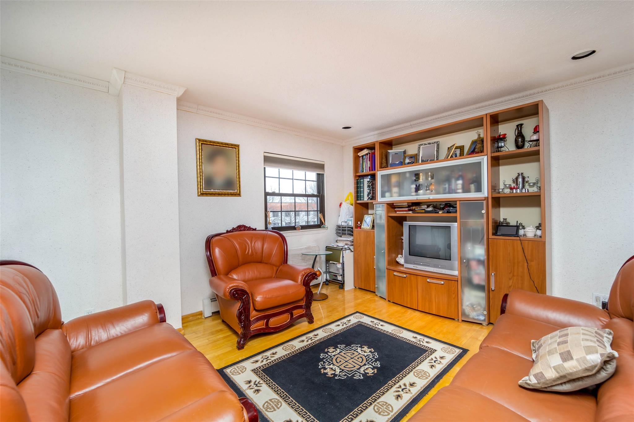 509 Julius Road Queens, NY 11356 - Photo 9 of 26 a living room with furniture and a window