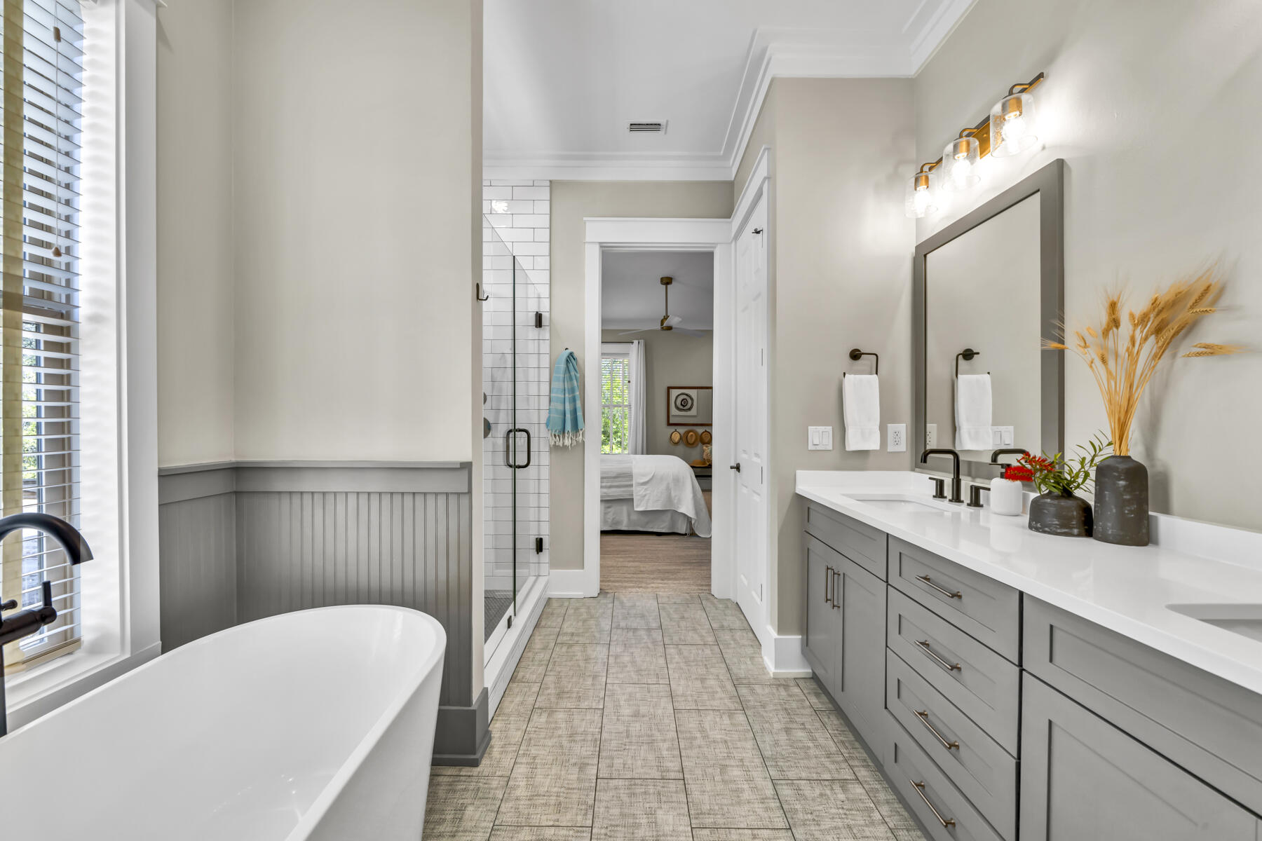 86 Grayton Village Road Santa Rosa Beach, FL 32459 - Photo 22 of 42 a spacious en suite bathroom with a double vanity sink a large mirror and a shower