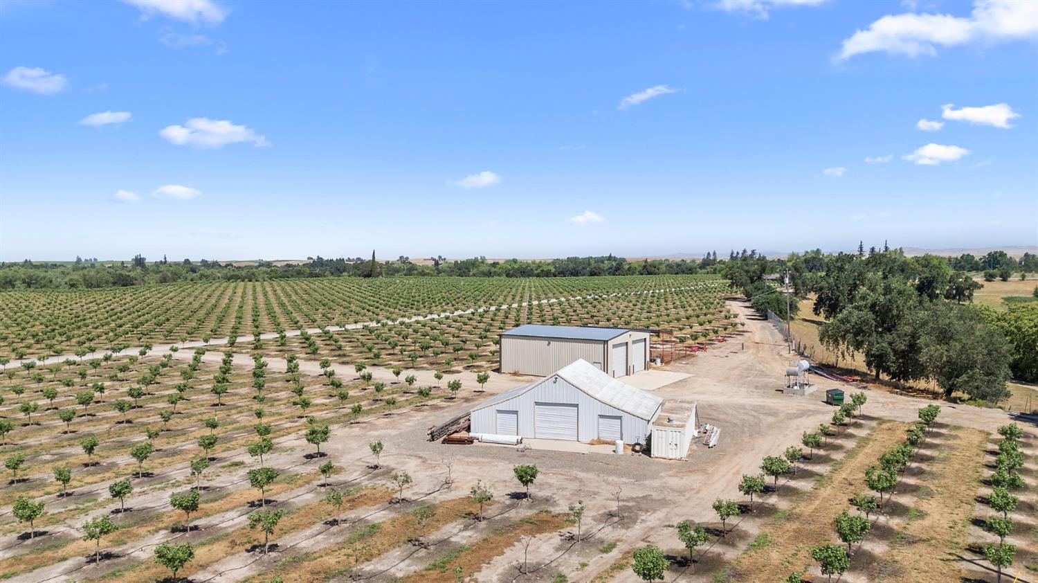 15726 Allen Road Snelling, CA 95369 - Photo 3 of 16 a view of a lake with houses in the back