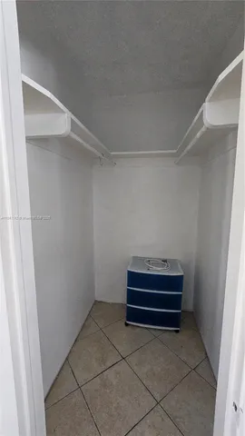 a room with a washer and a dryer