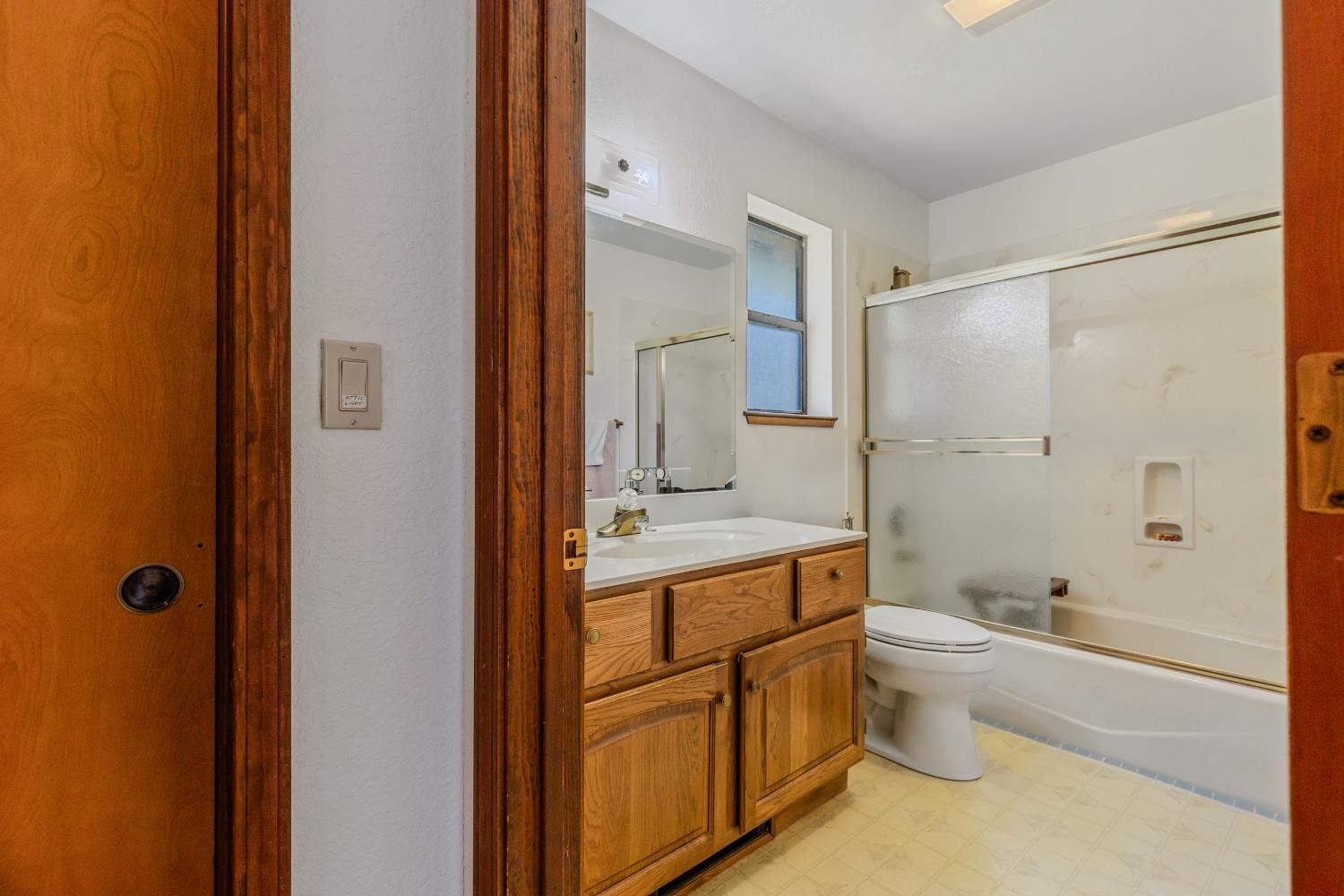 3120 Iron Mine Road Auburn, CA 95602 - Photo 14 of 38 a bathroom with a granite countertop sink a toilet and shower