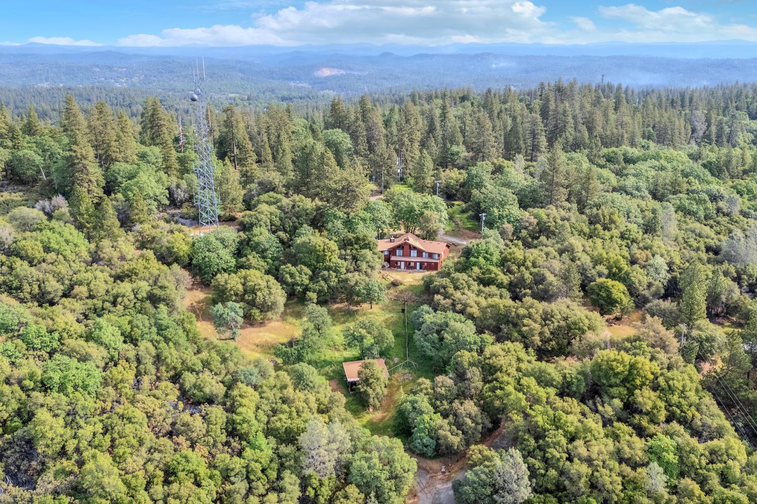 3120 Iron Mine Road Auburn, CA 95602 - Photo 20 of 38 a view of a city with lush green forest