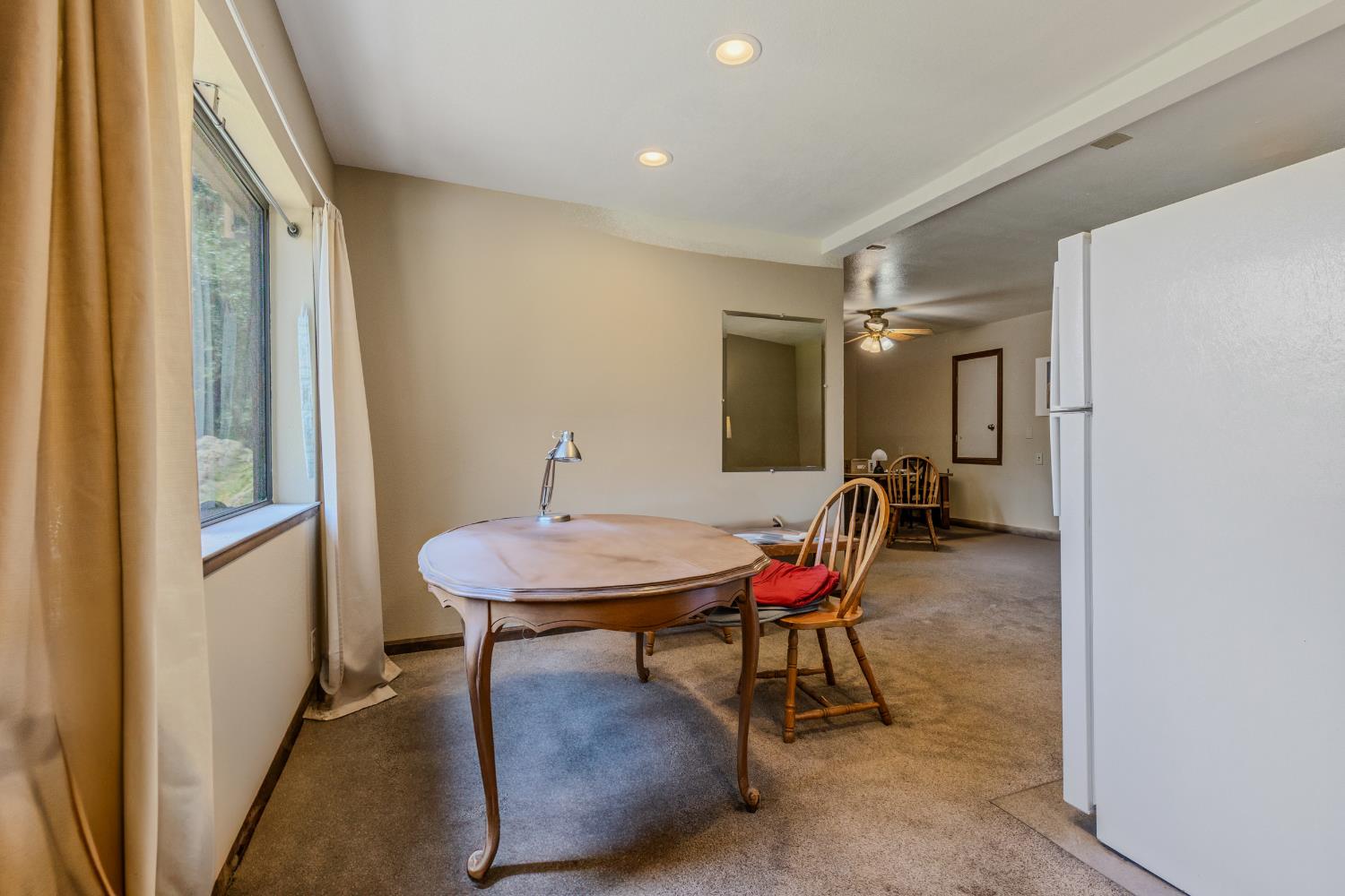 3120 Iron Mine Road Auburn, CA 95602 - Photo 27 of 38 a room with furniture and a table