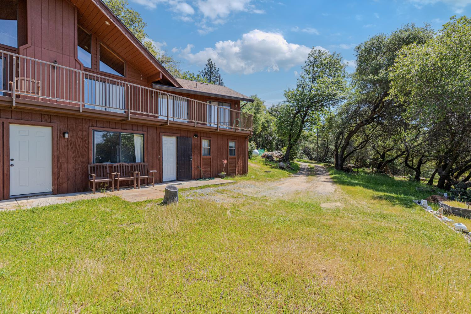 3120 Iron Mine Road Auburn, CA 95602 - Photo 3 of 38 a view of a house with swimming pool and sitting area