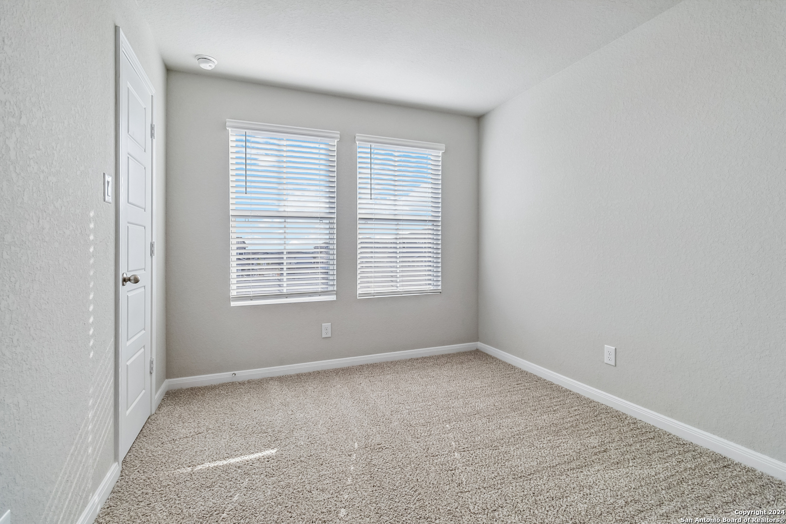 3915 Abbott Pass St. Hedwig, TX 78152 - Photo 17 of 35 an empty room with a window