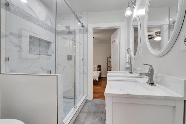 a kitchen with a sink cabinets and appliances
