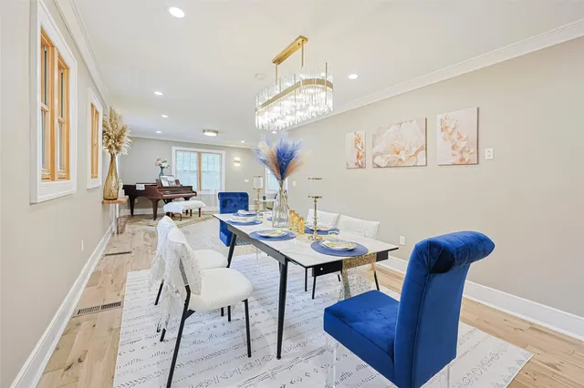 a work room with furniture and wooden floor