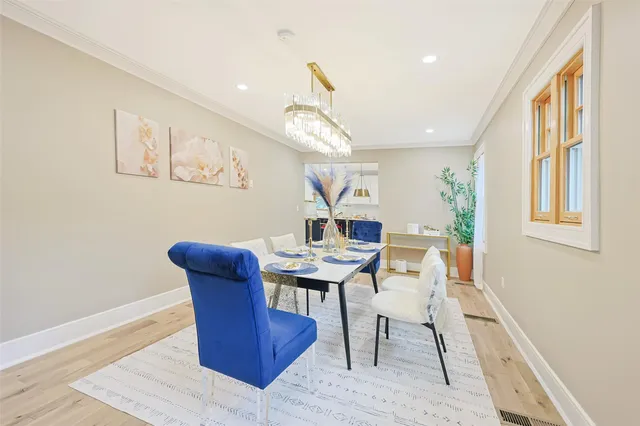 a kitchen that has a lot of cabinets in it and appliances