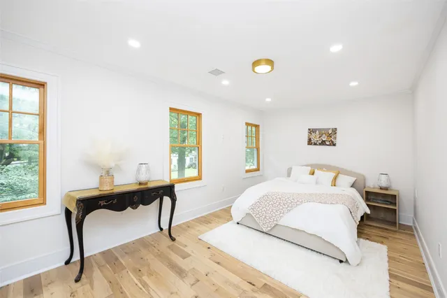 a bathroom with a sink toilet tub and shower