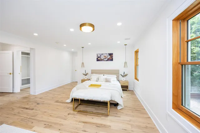 a bathroom with a sink a toilet and tub