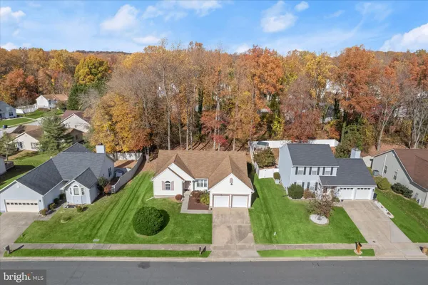 an aerial view of a house with garden