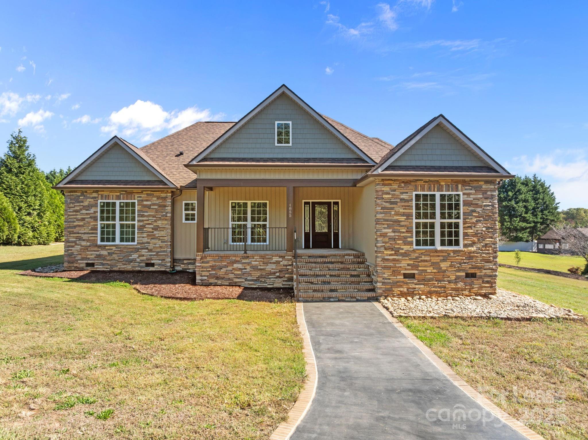 4855 New Cut Road Inman, SC 29349 - Photo 1 of 40 a front view of a house with swimming pool
