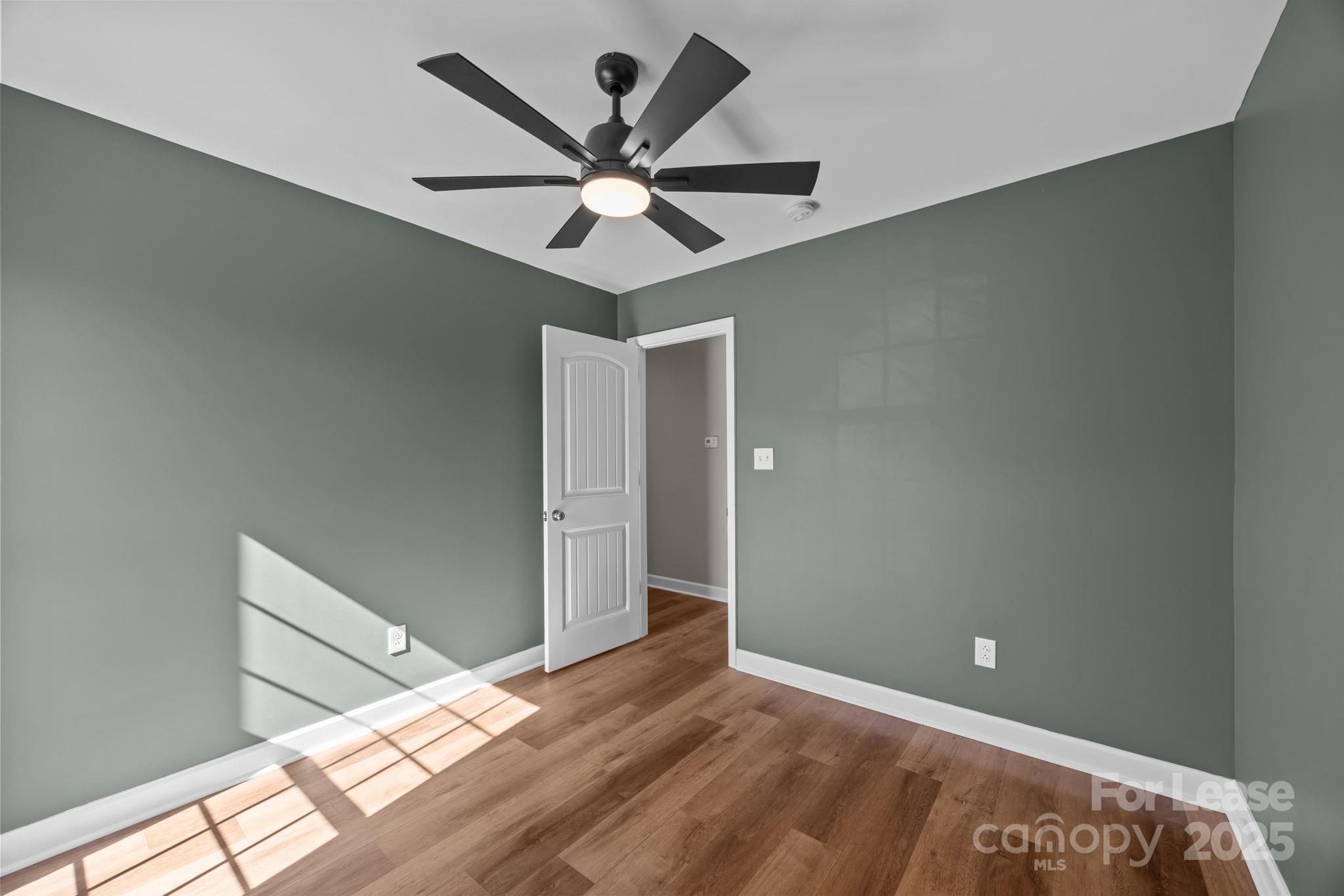 4855 New Cut Road Inman, SC 29349 - Photo 27 of 40 a view of a big room with wooden floor