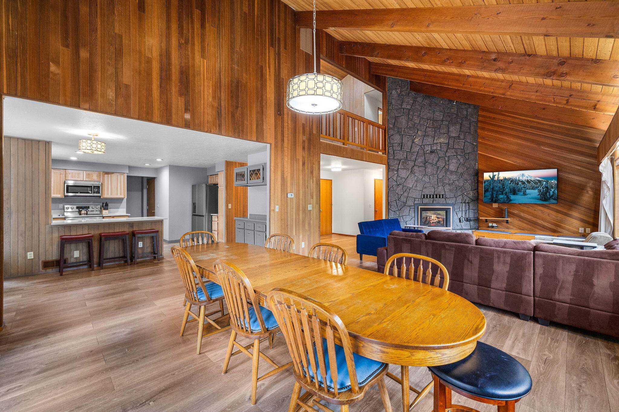 13168 Hawks Beard Black Butte Ranch, OR 97759 - Photo 1 of 47 a view of a dining room with furniture window and wooden floor