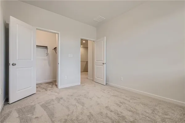 a bathroom with a sink a toilet a bathtub and shower